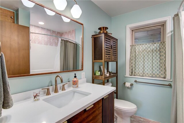 1418 Keith St, Eau Claire, WI 54701 - bathroom featuring vanity and a shower with shower curtain