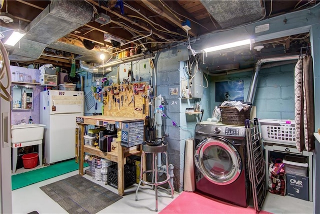 1418 Keith St, Eau Claire, WI 54701 - unfinished below grade area featuring freestanding refrigerator, a workshop area, and electric panel