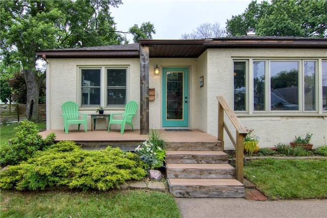 1418 Keith St, Eau Claire, WI 54701 - view of front of house featuring stucco siding