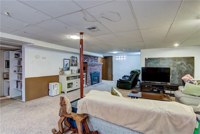 1418 Keith St, Eau Claire, WI 54701 - living area featuring a paneled ceiling, a fireplace, and carpet flooring