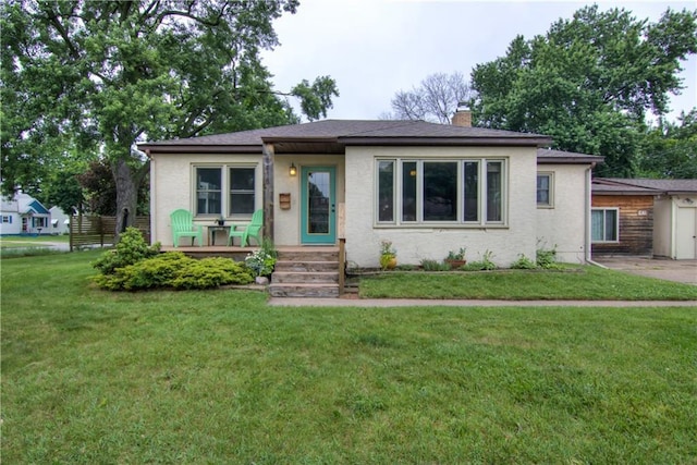 1418 Keith St, Eau Claire, WI 54701 - view of front of home featuring a front yard and a chimney