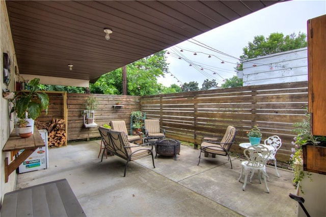 1418 Keith St, Eau Claire, WI 54701 - fenced backyard with a patio area and a fire pit