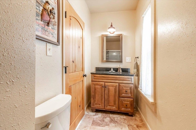 117 6th St, Nekoosa, WI 54457 - half bath with vanity and a textured wall
