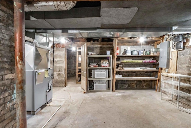 117 6th St, Nekoosa, WI 54457 - unfinished below grade area with electric panel and heating unit
