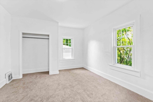 117 6th St, Nekoosa, WI 54457 - unfurnished bedroom with carpet flooring and a closet