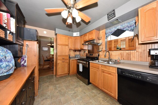 819 S 90th St, West Allis, WI 53214 - kitchen featuring black dishwasher, gas range, under cabinet range hood, a ceiling fan, and light countertops