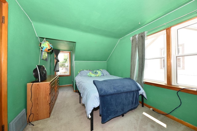 819 S 90th St, West Allis, WI 53214 - carpeted bedroom with lofted ceiling and baseboards