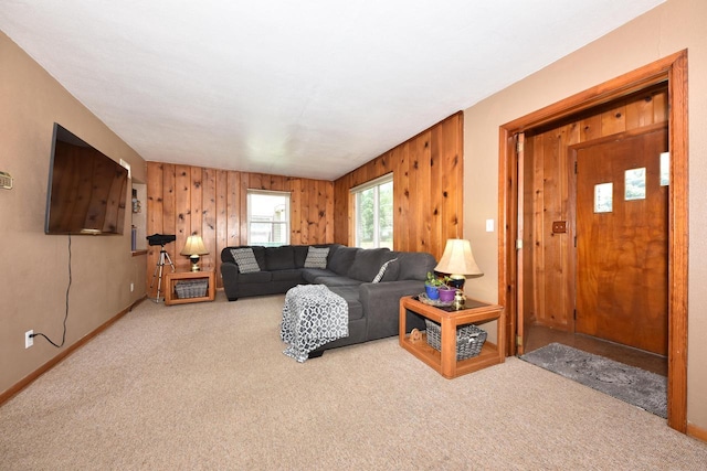 819 S 90th St, West Allis, WI 53214 - carpeted living area featuring wood walls and baseboards
