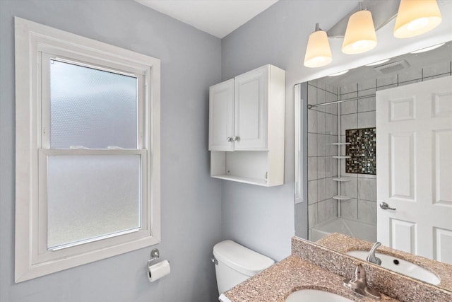 1716 Michael Dr, Waukesha, WI 53189 - full bath featuring vanity, healthy amount of natural light, and tub / shower combination