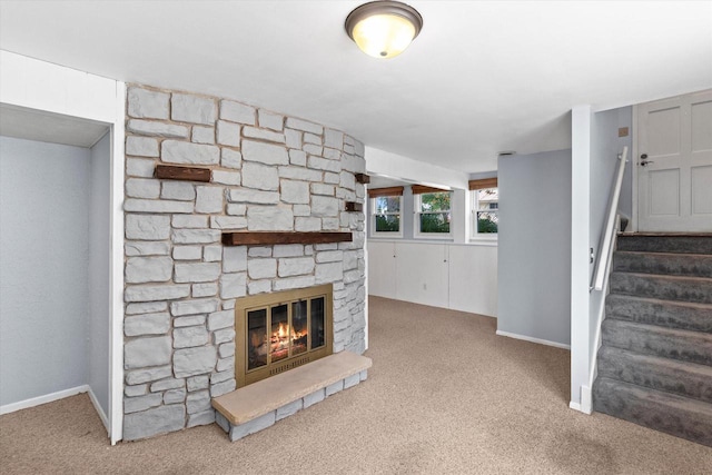 1716 Michael Dr, Waukesha, WI 53189 - unfurnished living room featuring carpet flooring, a fireplace, and stairway