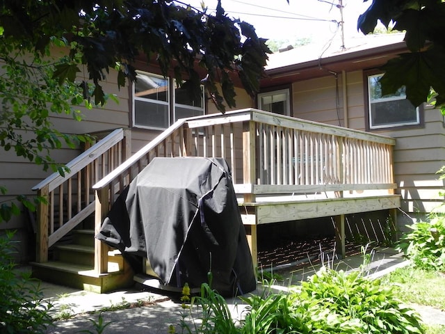 206 S High St, Port Washington, WI 53074 - wooden terrace featuring a grill and stairs