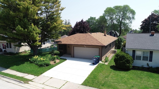 206 S High St, Port Washington, WI 53074 - single story home with a front lawn, driveway, a garage, and roof with shingles
