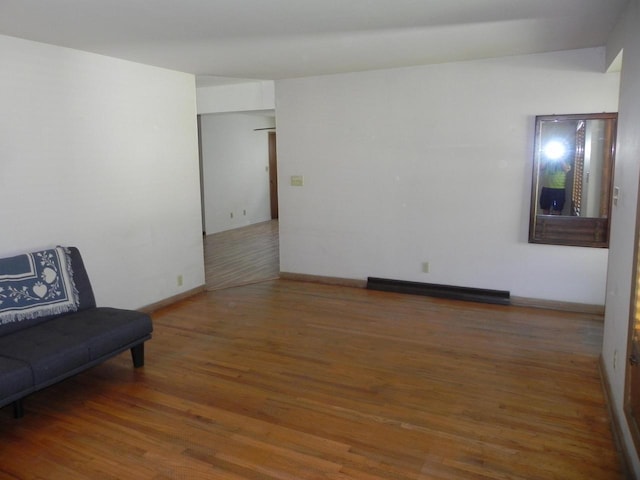 206 S High St, Port Washington, WI 53074 - living area featuring wood finished floors and baseboards