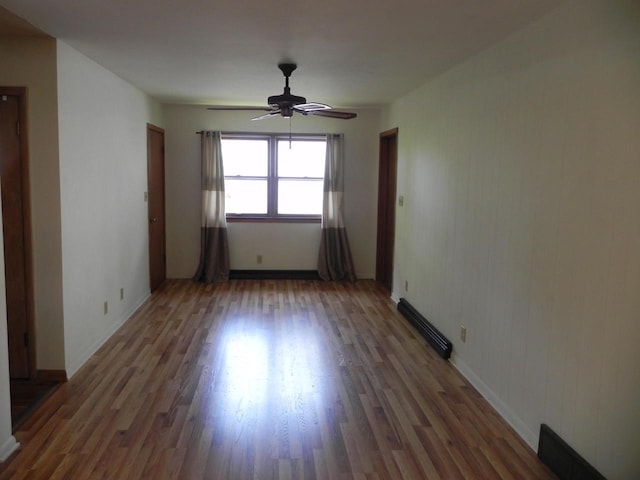 206 S High St, Port Washington, WI 53074 - unfurnished room featuring wood finished floors and a ceiling fan
