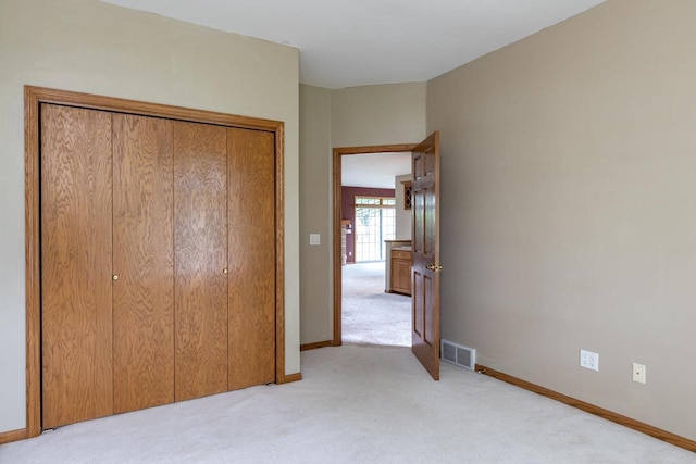 4431 Bellhaven Ln, Oshkosh, WI 54904 - unfurnished bedroom with light carpet and a closet