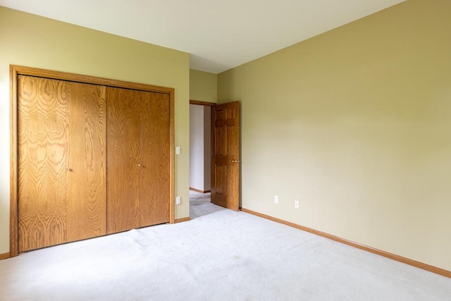 4431 Bellhaven Ln, Oshkosh, WI 54904 - unfurnished bedroom featuring carpet flooring and a closet