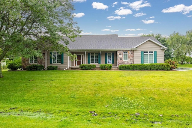 4431 Bellhaven Ln, Oshkosh, WI 54904 - view of front of property with a porch, a front lawn, and a shingled roof