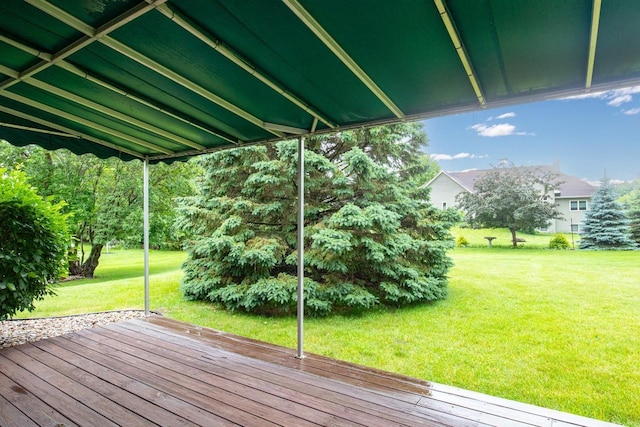 4431 Bellhaven Ln, Oshkosh, WI 54904 - wooden deck featuring a lawn
