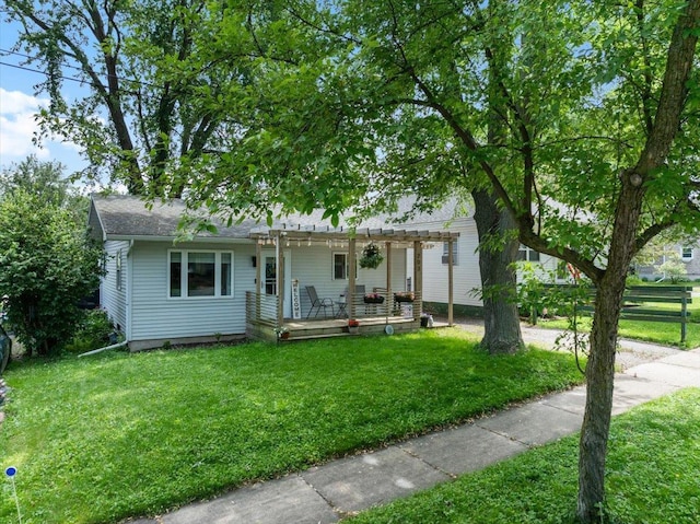 203 N Vine St, Marshfield, WI 54449 - view of front of house featuring a pergola and a deck