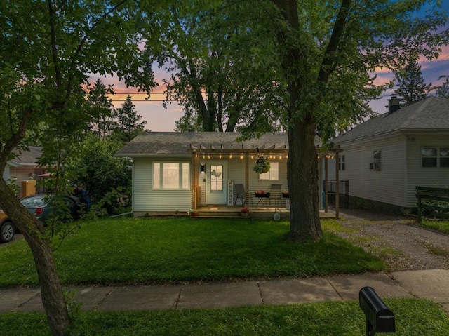 203 N Vine St, Marshfield, WI 54449 - view of front of property featuring a front lawn and a pergola