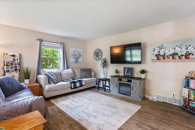 203 N Vine St, Marshfield, WI 54449 - living room with wood finished floors and baseboards