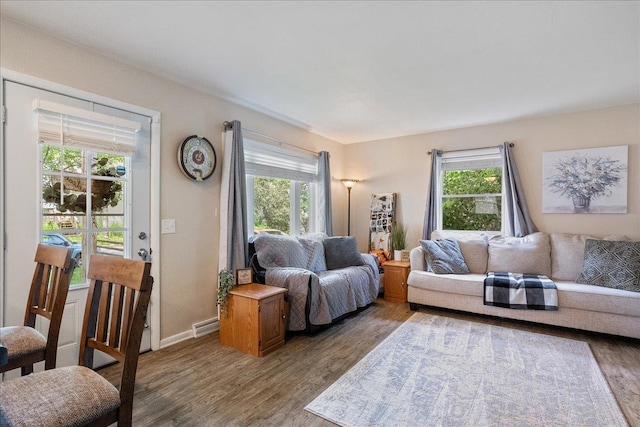 203 N Vine St, Marshfield, WI 54449 - living room featuring wood finished floors and baseboards