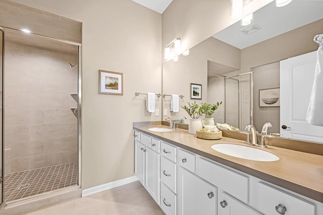 1382 Prairie Creek Cir Unit 15D, Oconomowoc, WI 53066 - bathroom featuring a shower stall, double vanity, and tile patterned floors
