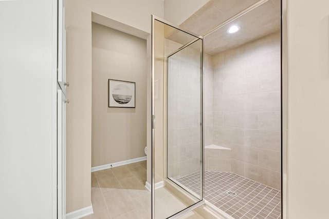 1382 Prairie Creek Cir Unit 15D, Oconomowoc, WI 53066 - bathroom featuring a stall shower, tile patterned floors, and recessed lighting