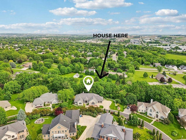 1706 Ashlawn Ln, Waunakee, WI 53597 - aerial view of residential area featuring a tree filled landscape