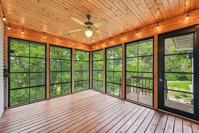1706 Ashlawn Ln, Waunakee, WI 53597 - unfurnished sunroom with a ceiling fan, wood ceiling, and hardwood / wood-style floors