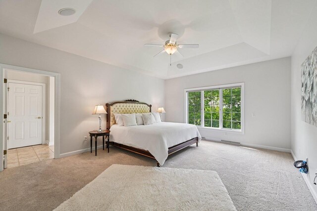 1706 Ashlawn Ln, Waunakee, WI 53597 - bedroom featuring carpet floors, a raised ceiling, and ceiling fan
