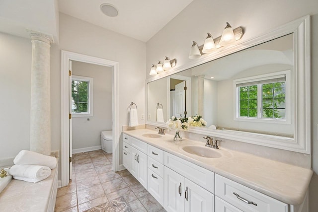 1706 Ashlawn Ln, Waunakee, WI 53597 - full bathroom with double vanity and ornate columns
