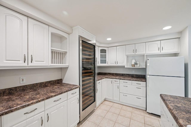 1706 Ashlawn Ln, Waunakee, WI 53597 - kitchen featuring freestanding refrigerator, beverage cooler, white cabinetry, open shelves, and recessed lighting