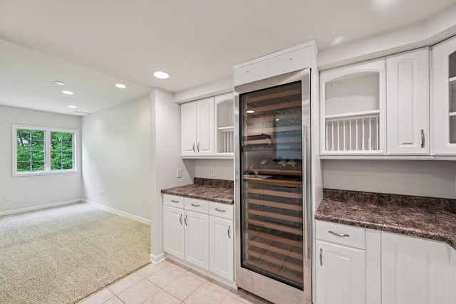 1706 Ashlawn Ln, Waunakee, WI 53597 - indoor bar with wine cooler, light colored carpet, recessed lighting, and light tile patterned floors