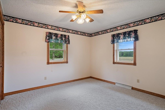 7269 County Road V, Marshfield, WI 54449 - spare room featuring carpet, ceiling fan, and a textured ceiling