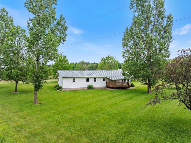 7269 County Road V, Marshfield, WI 54449 - view of green lawn featuring a wooden deck