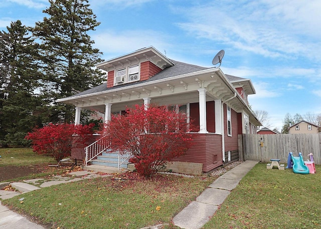 1416 Michigan Ave Unit 1416A, Sheboygan, WI 53081 - view of front facade featuring a porch and a shingled roof