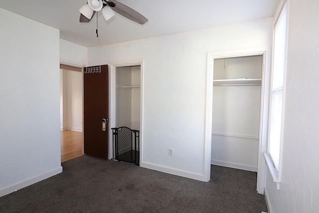 1416 Michigan Ave Unit 1416A, Sheboygan, WI 53081 - unfurnished bedroom with carpet flooring, multiple closets, and ceiling fan
