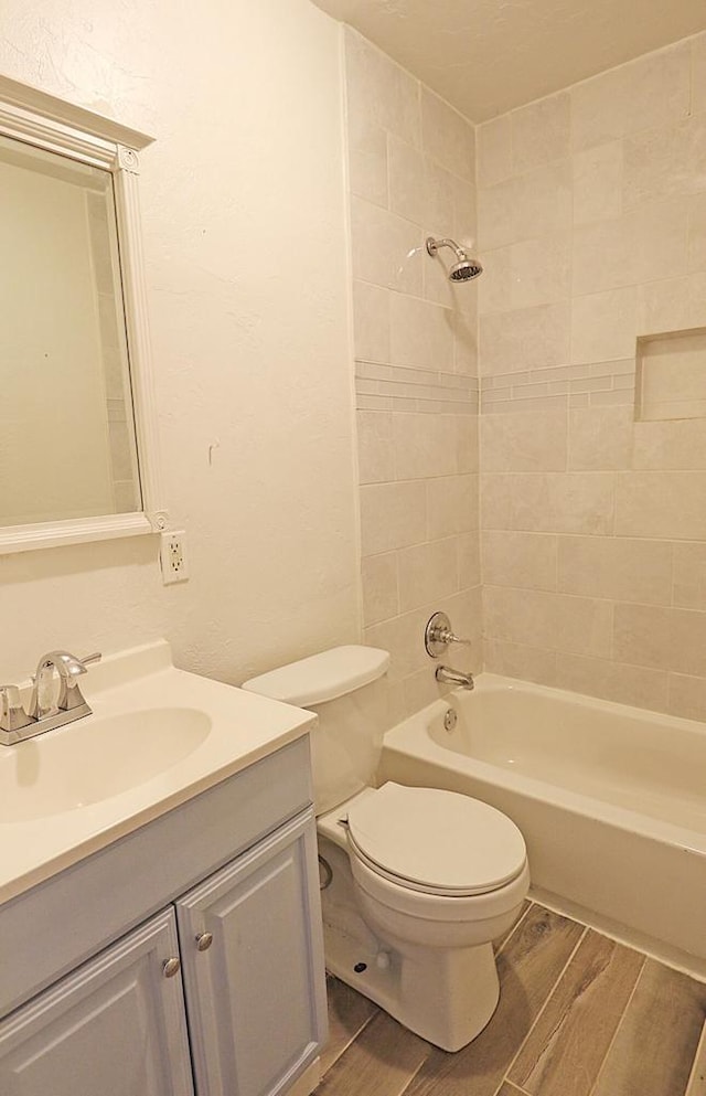 1416 Michigan Ave Unit 1416A, Sheboygan, WI 53081 - bathroom with wood finished floors, vanity, and washtub / shower combination