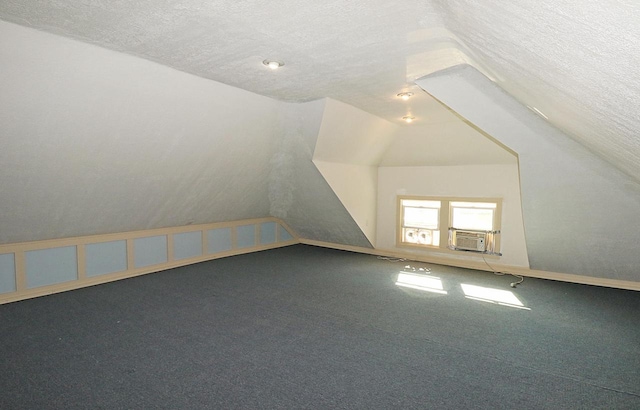 1416 Michigan Ave Unit 1416A, Sheboygan, WI 53081 - additional living space featuring a textured ceiling, carpet, and lofted ceiling