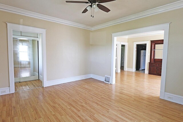 1416 Michigan Ave Unit 1416A, Sheboygan, WI 53081 - spare room with ornamental molding, ceiling fan, and light wood finished floors