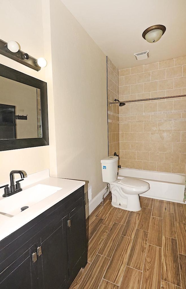 1416 Michigan Ave Unit 1416A, Sheboygan, WI 53081 - full bath with vanity, wood finish floors, and bathtub / shower combination