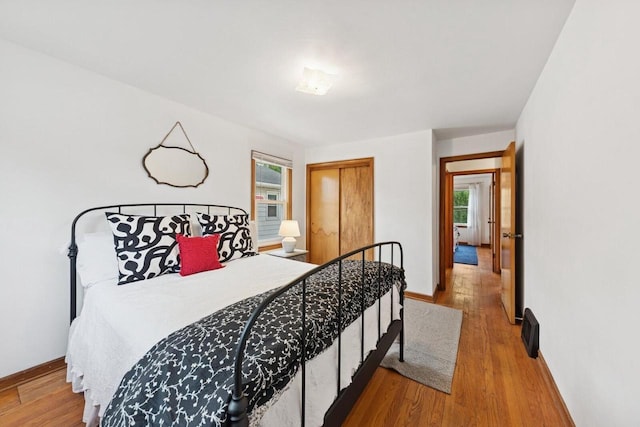6109 38th Ave, Kenosha, WI 53142 - bedroom with wood finished floors and a closet