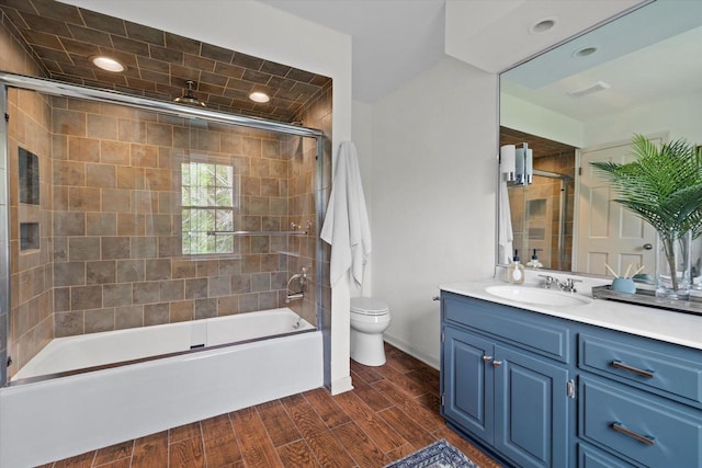 9848 N Lamplighter Ln, Mequon, WI 53092 - full bath featuring vanity, enclosed tub / shower combo, wood finished floors, and recessed lighting