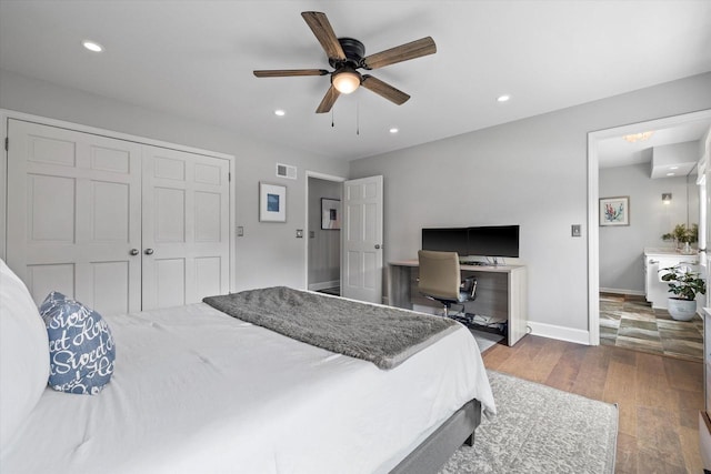 9848 N Lamplighter Ln, Mequon, WI 53092 - bedroom with wood finished floors, recessed lighting, ceiling fan, and a closet