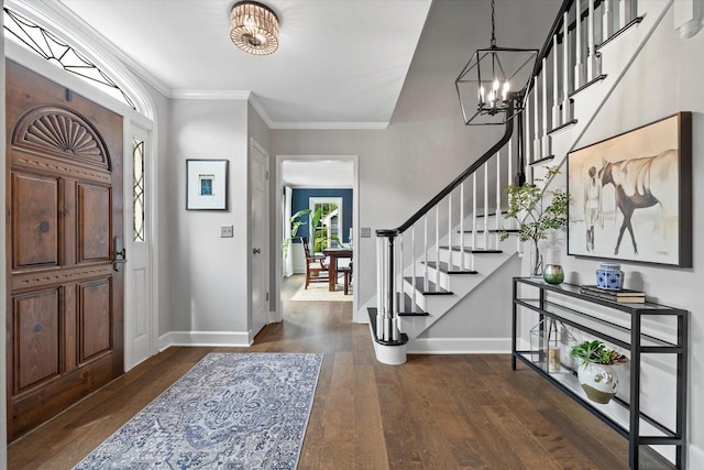 9848 N Lamplighter Ln, Mequon, WI 53092 - entryway featuring a chandelier, stairs, dark wood finished floors, and crown molding