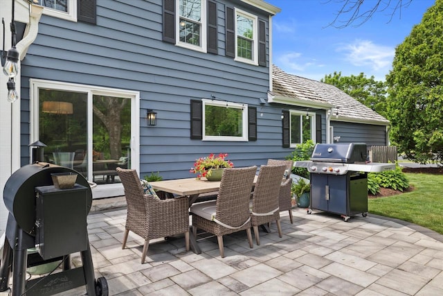 9848 N Lamplighter Ln, Mequon, WI 53092 - view of patio with grilling area and outdoor dining space