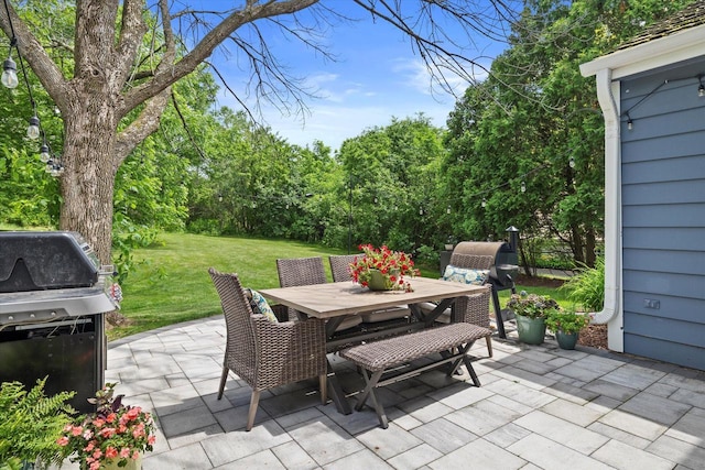 9848 N Lamplighter Ln, Mequon, WI 53092 - view of patio featuring outdoor dining space and grilling area