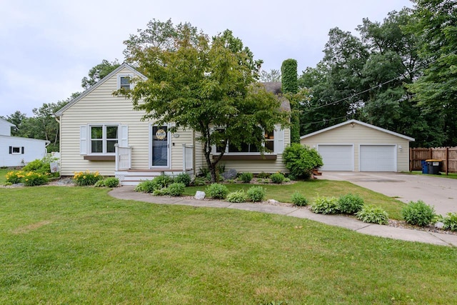 1119 W Grand Ave, Rothschild, WI 54474 - view of front of house with a garage and an outdoor structure
