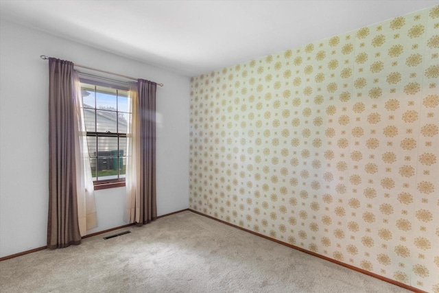 W173N8465 Robert Ave, Menomonee Falls, WI 53051 - unfurnished room featuring light carpet and wallpapered walls
